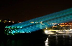 Europe Évènement - Logo and lettering projection - Photo of a logo projection indicating Group auto union international on the city of Biarritz